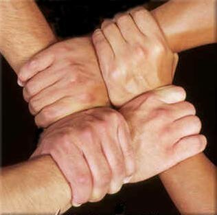 Four arms grasging their neighbor's wrist